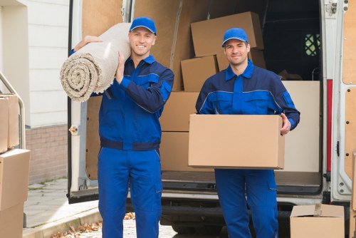 Packed office boxes and furniture ready for removals in Borough