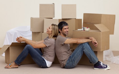 Team handling boxes and office items during a Borough relocation