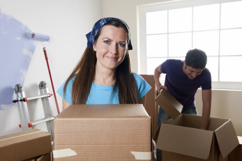 Van and driver handling boxes and furniture for Borough customers