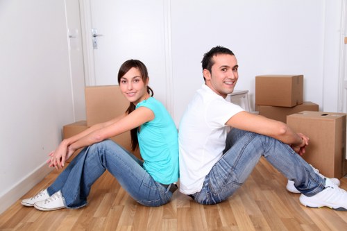 Local moving team handling boxes and household items