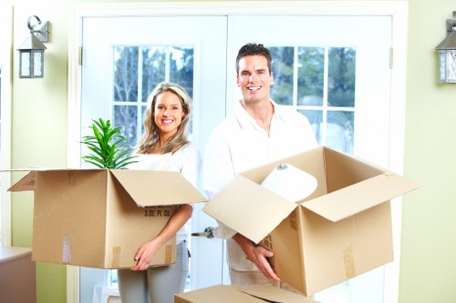 Fragile household items being securely packed for a Borough move